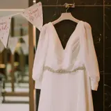 Wedding dress hung up in Hotel Room