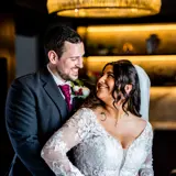 Couple hugging and looking at each other