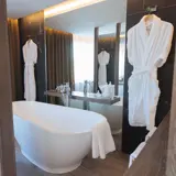 Bathroom set up with 2 robes