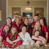 Bride and Bridesmaid posing for picture in Honeymoon suite