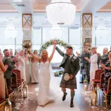 Couple just married walking down the aisle