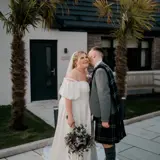Couple kissing in garden