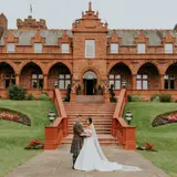 Couple posing outside of Boclair House