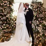 Couple kissing at the altar