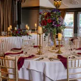tables set up for dinner at a wedding