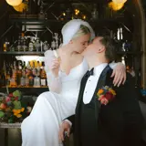 Couple kissing in the bar at Cornhill Castle
