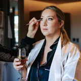 Bride having make up done