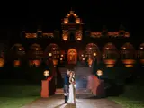 Couple outside of Boclair House at night
