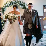 Couple just married walking up the aisle