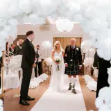 Father and daughter walking down the aisle