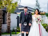 Couple walking in sunshine