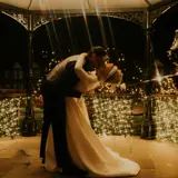 Couple sharing a kiss in the bandstand