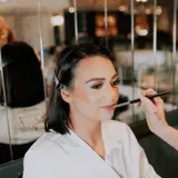 Bride having her make up done
