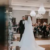 Couple saying their vows at the altar