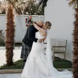 Couple kissing in garden