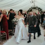 Couple just married walking down the aisle