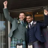 Male couple celebrating getting married