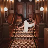 Couple lying on stairs