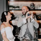 Couple mixing cocktails