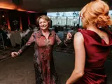 Women dancing at a corporate event