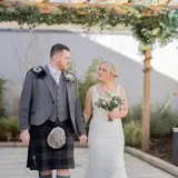 Couple in The Garden House garden at Redhurst