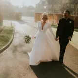 Couple walking the grounds of Boclair