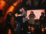 Steve on stage giving away a prize