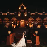 Couple outside Boclair House at night