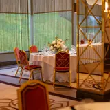 Tables set up for dinner at Boclair House Hotel
