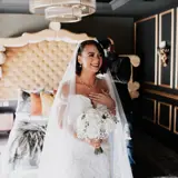 Bride holding flowers ahead of wedding day